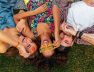 top-view-from-colorful-stylish-happy-young-company-friends-lying-grass-park-man-women-having-fun-together