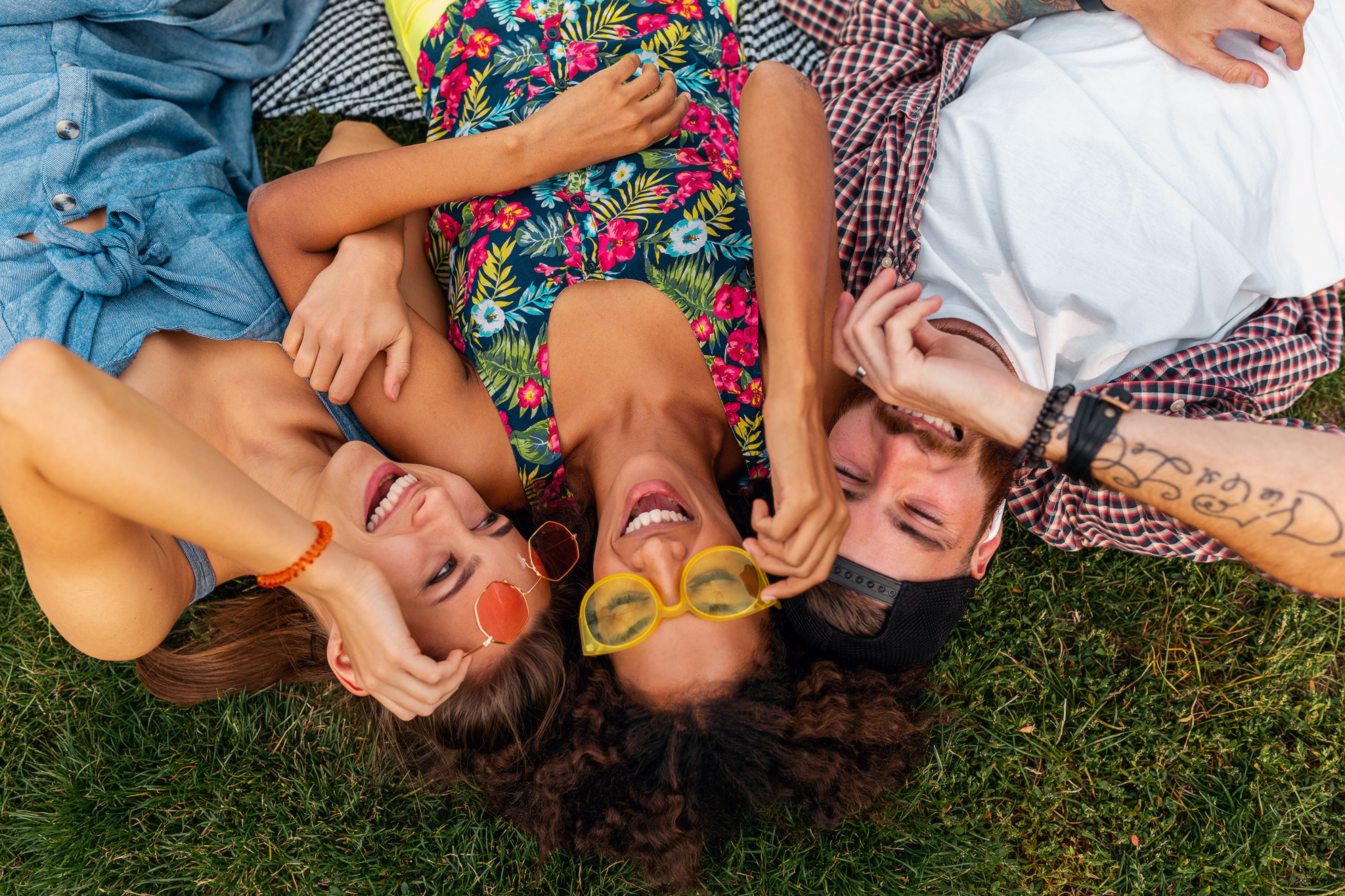 top-view-from-colorful-stylish-happy-young-company-friends-lying-grass-park-man-women-having-fun-together